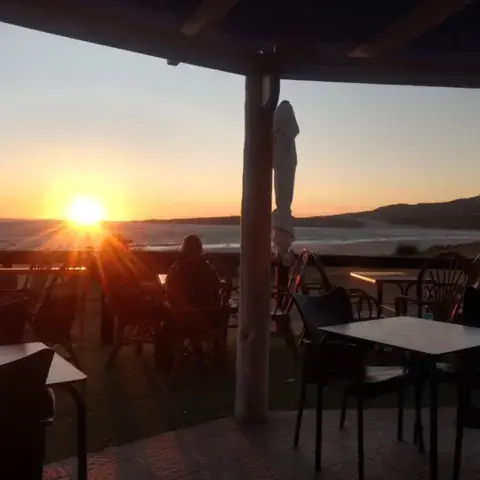 Coucher de soleil sur la terrasse