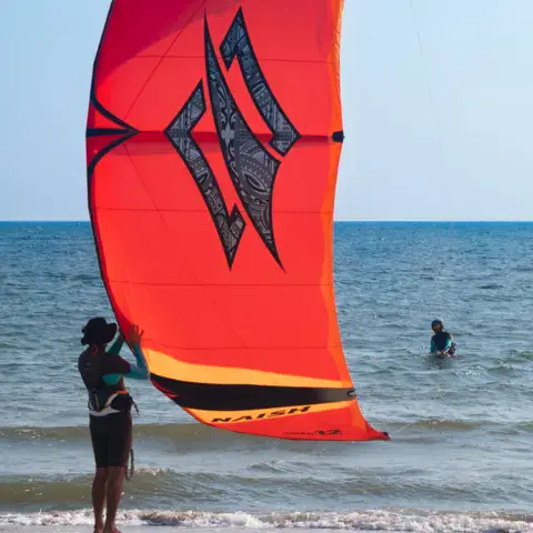 Mise en place d'un kite sur la plage
