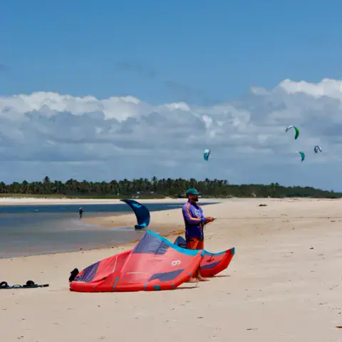 Kite rouge sur la plage de sable blanc