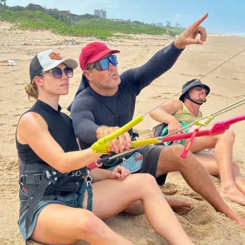Explications sur la plage avant la leçon