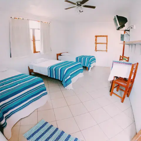 Chambre à trois lits