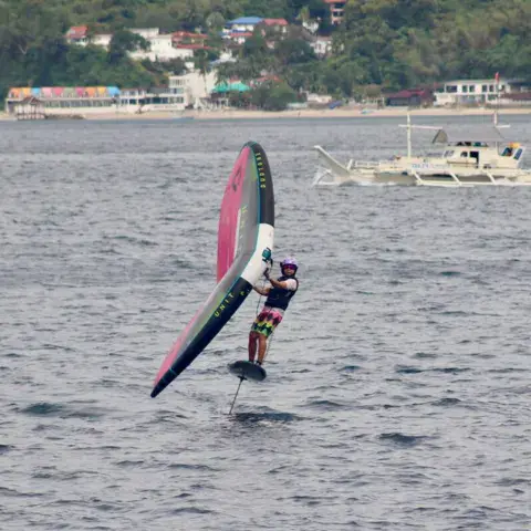 Rider en wing foil