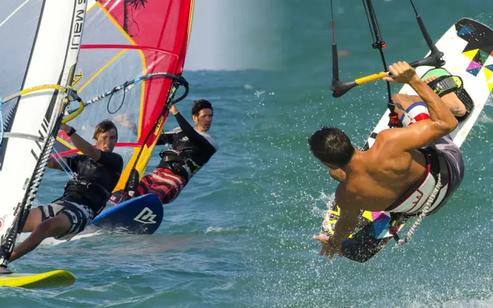 Windsurfeurs et kitesurfeur en navigation au large de Fano