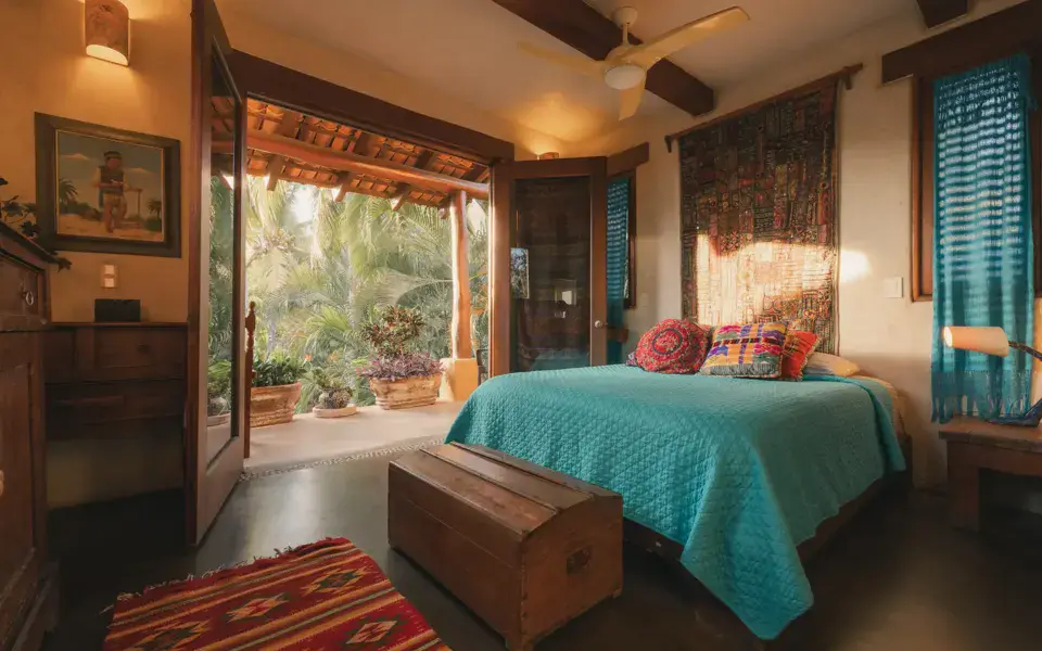 Chambre avec terrasse ouverte sur la végétation
