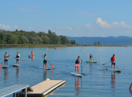 Cours de stand up paddle dans la baie de Saint-Blaise