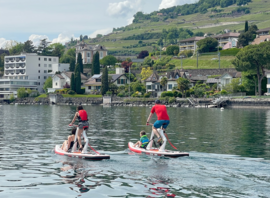 Paddle devant la rive de Corseaux et les vignes de Lavaux
