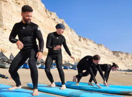 Cours collectif sur la plage, avant la mise à l'eau