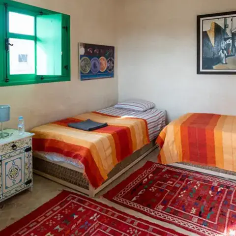Une des onze chambres de la surf house