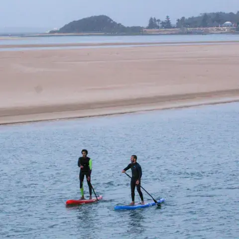 Sortie en stand up paddle sur l'eau plate de la lagune