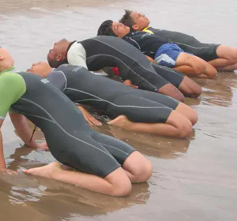 Exercices de redressement sur le sable