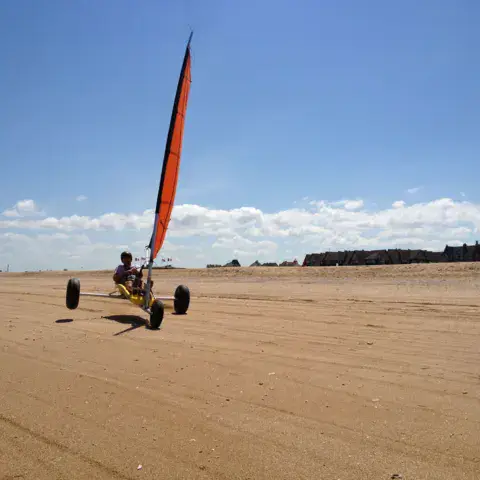 Char à voile sur la plage