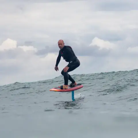 Foil dans une vague