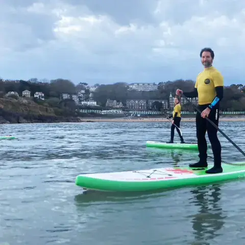Cours de stand up paddle en baie