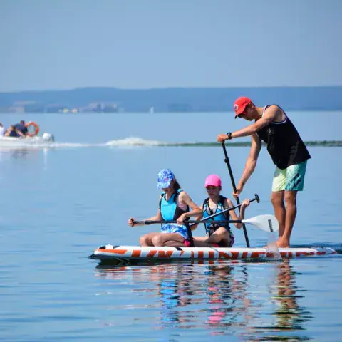 Initiation au paddle avec un moniteur