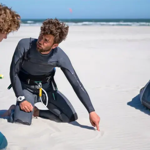 Explications du moniteur sur le sable